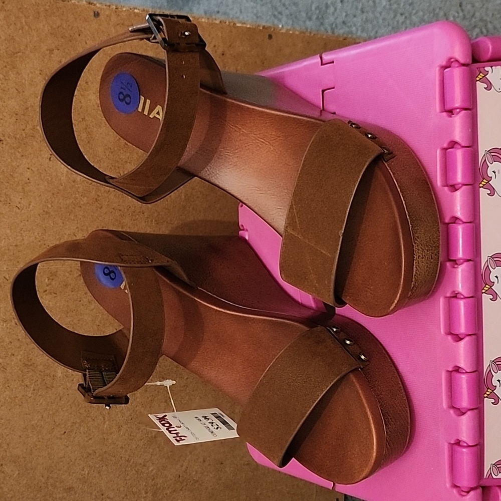 Brown suede wedges.
